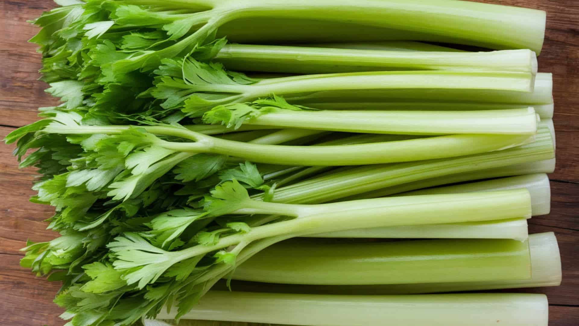 celery sticks fresh green crunchy low calorie snack close up natural light clean background