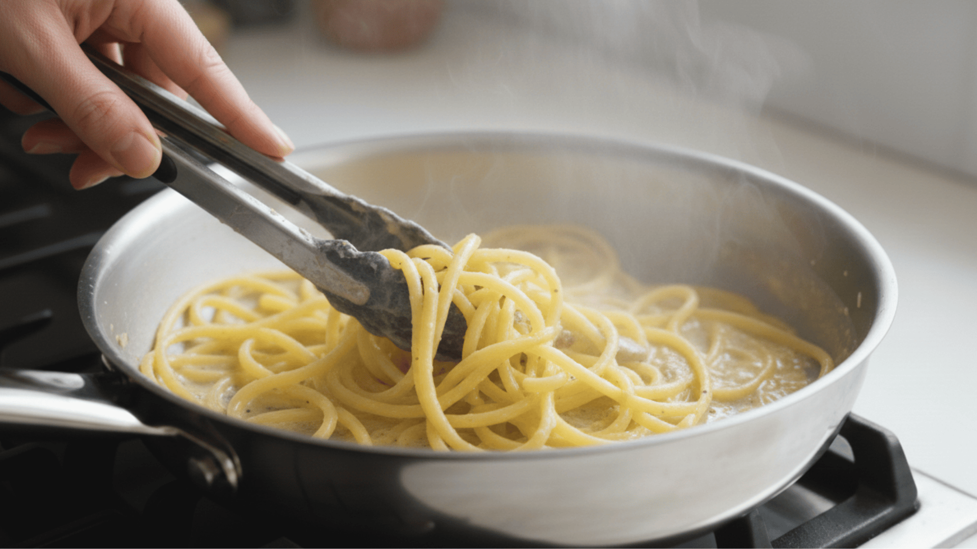 combing pasta and sauce