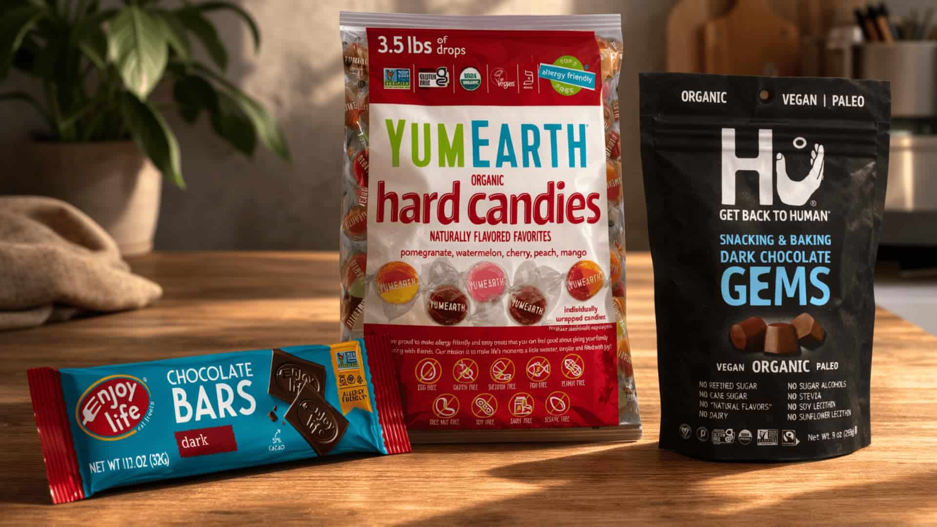 organic hard candies and dark chocolate bars arranged on a wooden table with soft natural light and realistic shadows