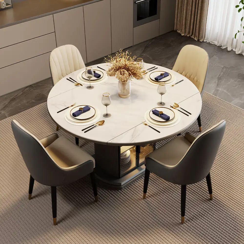 Modern dining area with a round marble table set for four, featuring gold accents and elegant chairs