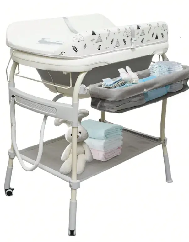 Changing table with white surface, shelves holding folded towels and a plush toy rabbit
