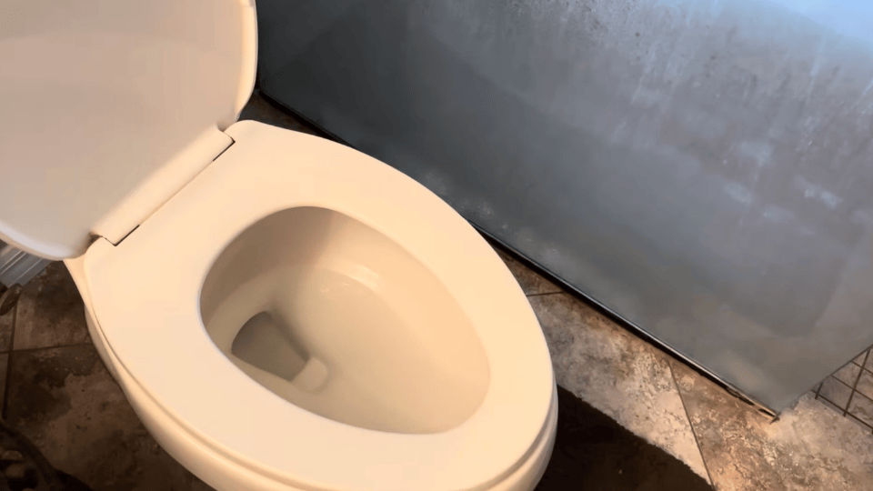 a picture of the toilet sit where the hot water is poured and waiting for the work done