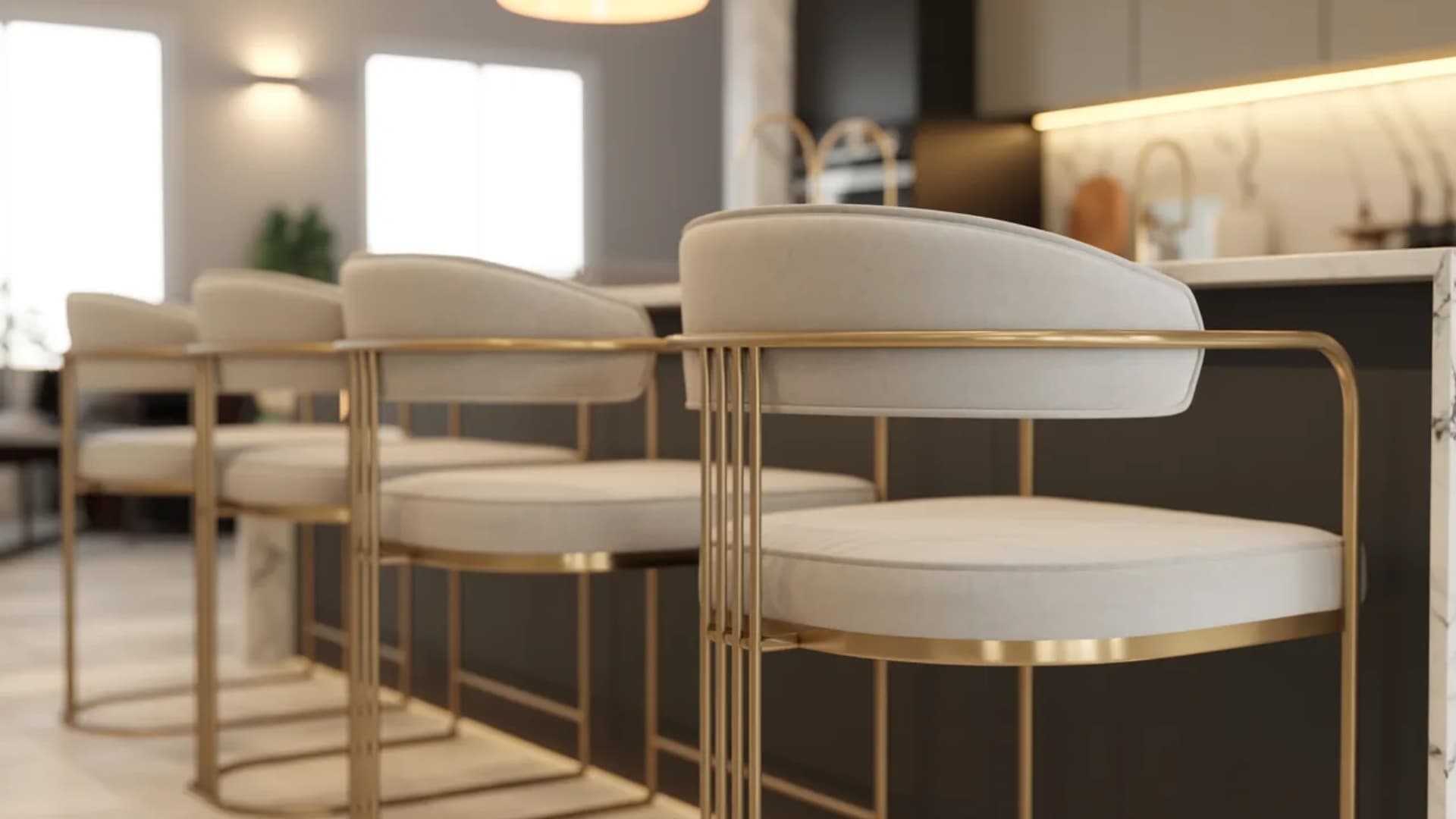 gold-accented barstools are a chic way to add style and comfort to your kitchen island