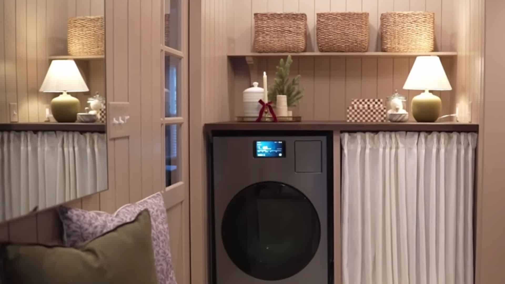 Laundry room with a folding surface and neatly clean , showing a simple and practical work setup.