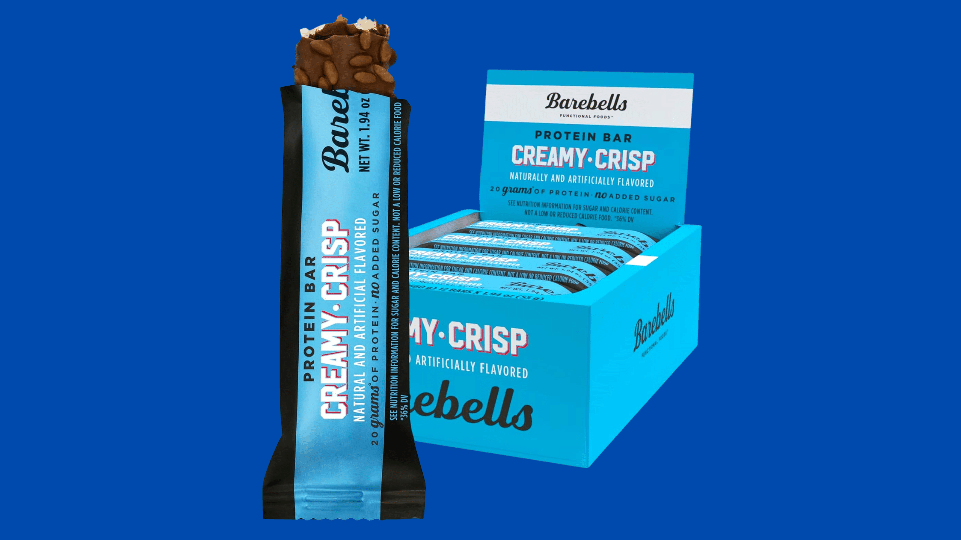barebells creamy crisp protein bar in blue packaging displayed beside an open box showing individually wrapped protein bars