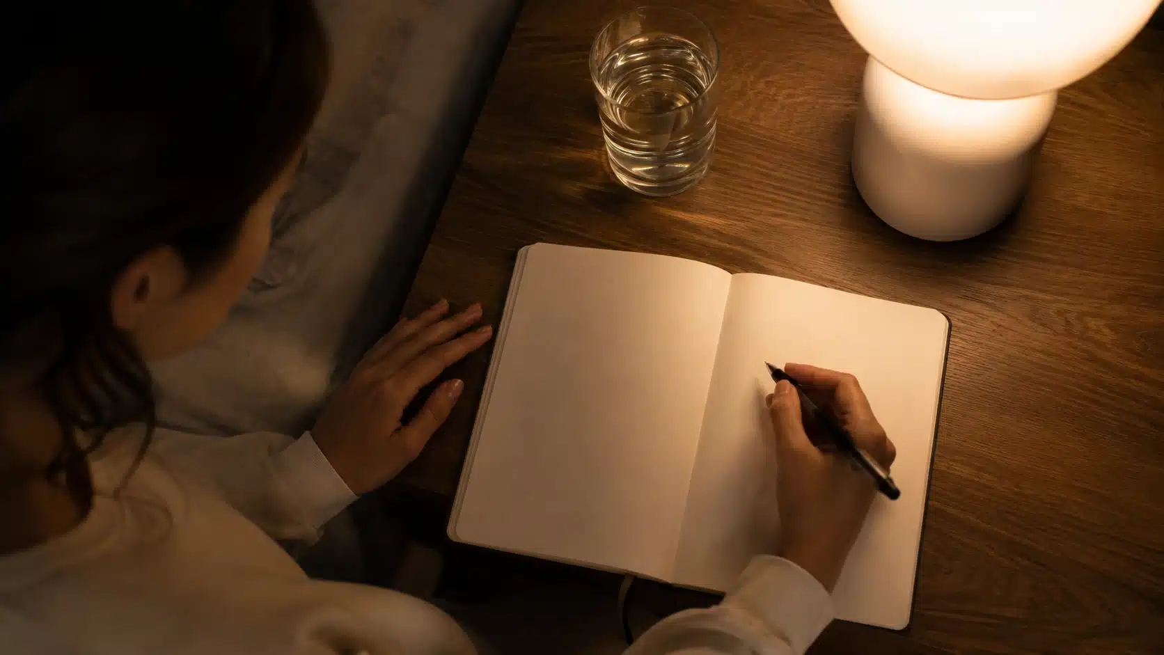 blank journal and pen showing simple journaling for how to work on yourself daily