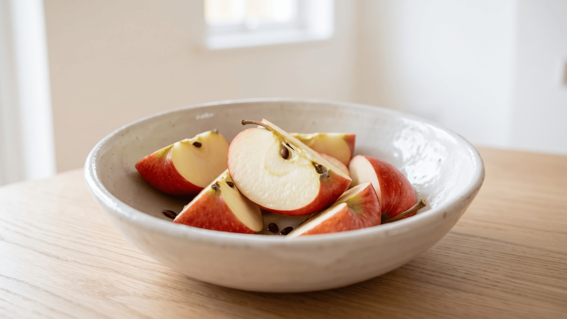 fresh apples arranged on a table as a healthy fruit that can be too high in natural carbs for keto