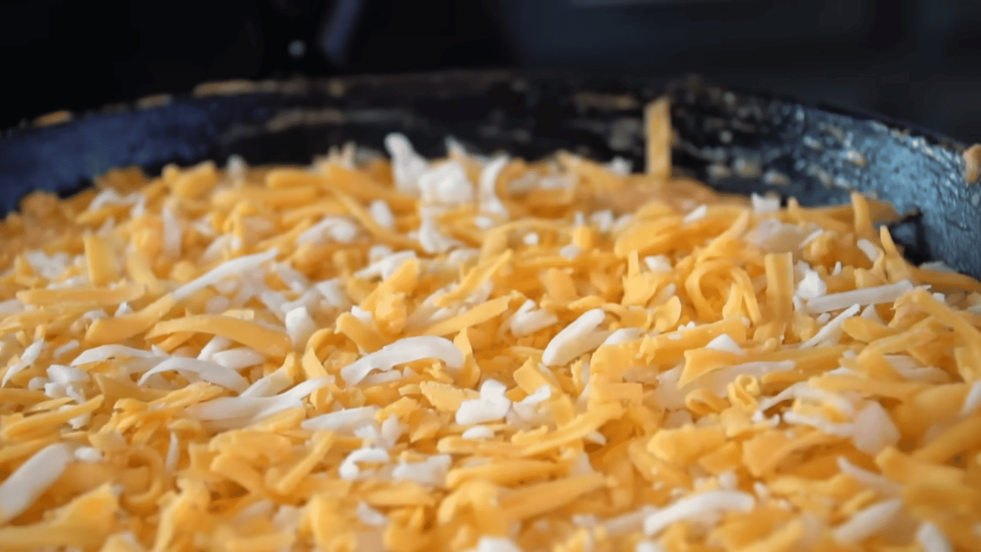 baked buffalo chicken dip topped with melted cheese and green onions