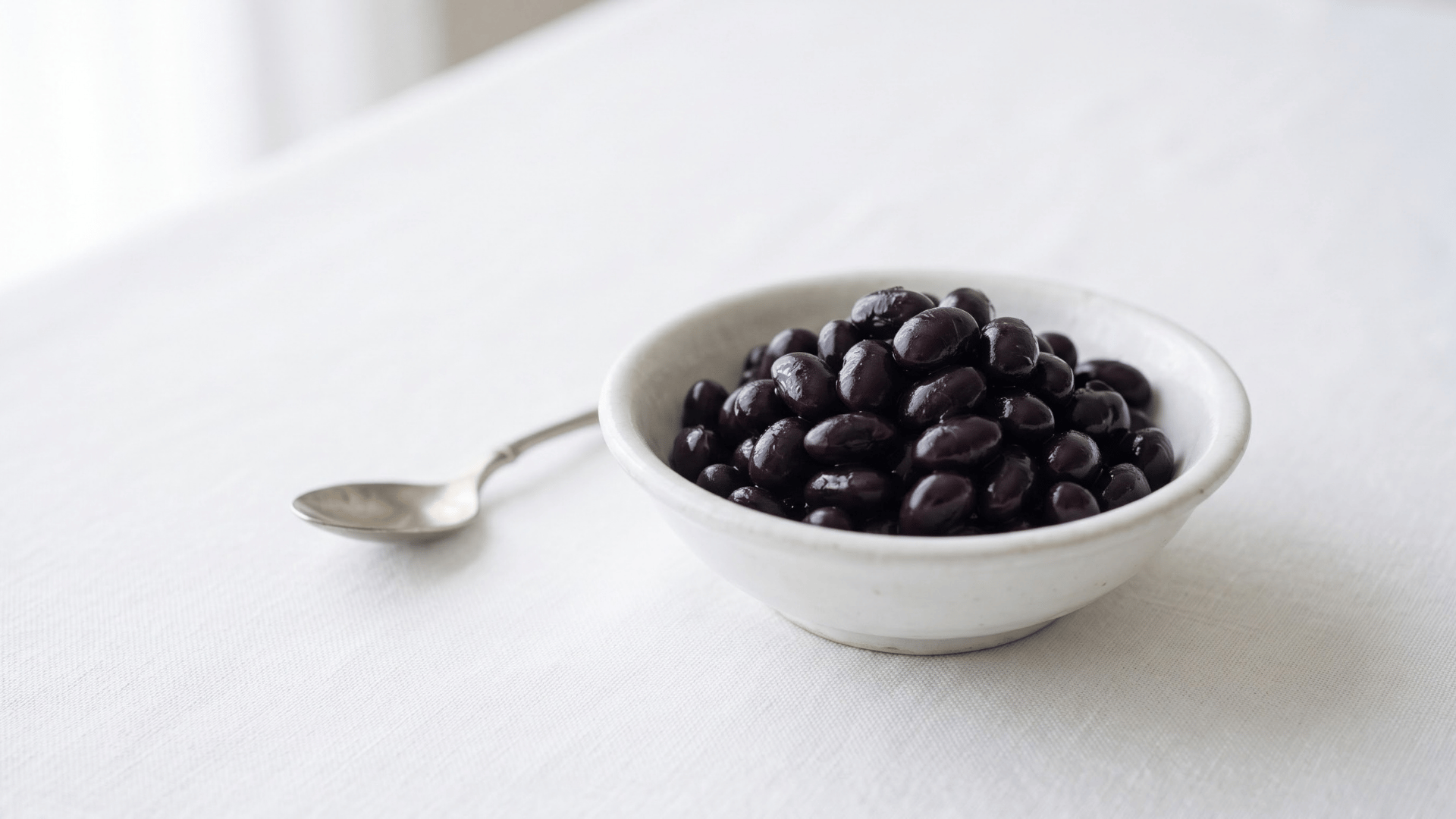 black soybeans served in a small bowl as a lower carb legume option for keto friendly meals