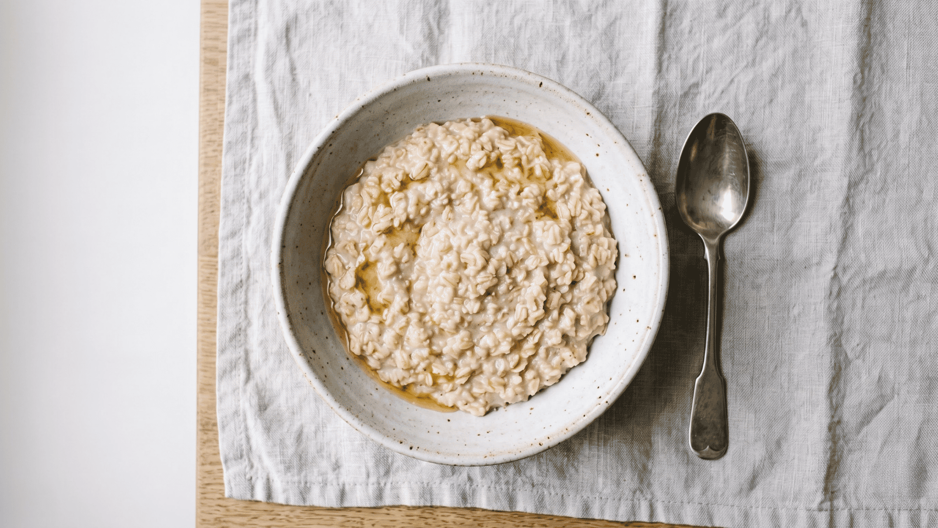 warm oatmeal served in a bowl as a nutritious breakfast food that may be too high in carbs for keto